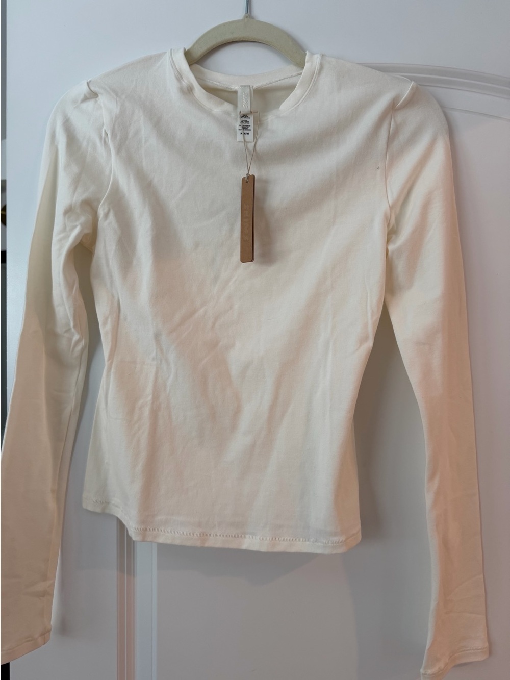 SKIMS Long Sleeve Crewneck Top in Cream